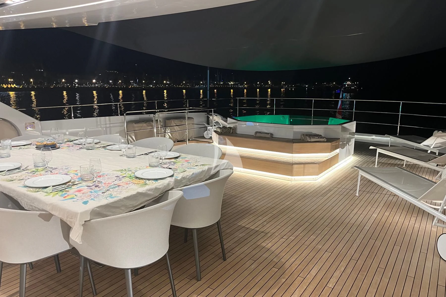 a room with tables and chairs aboard EDEN Yacht for Sale