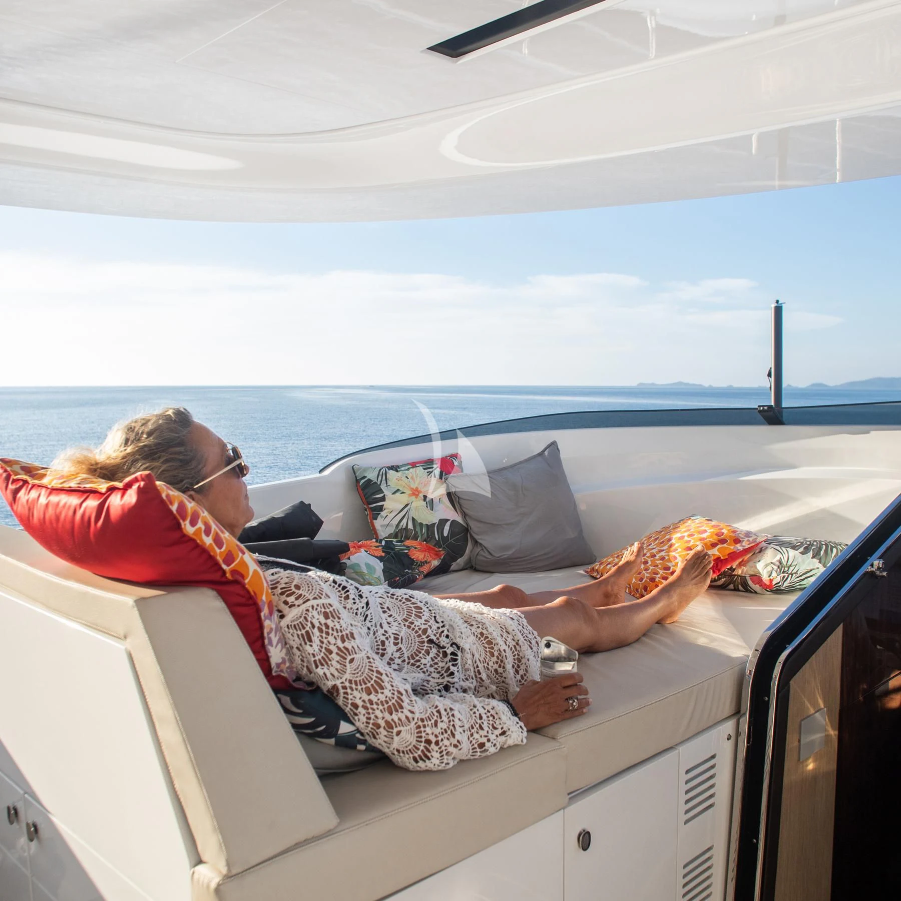 a person lying on a bed aboard EDEN Yacht for Sale