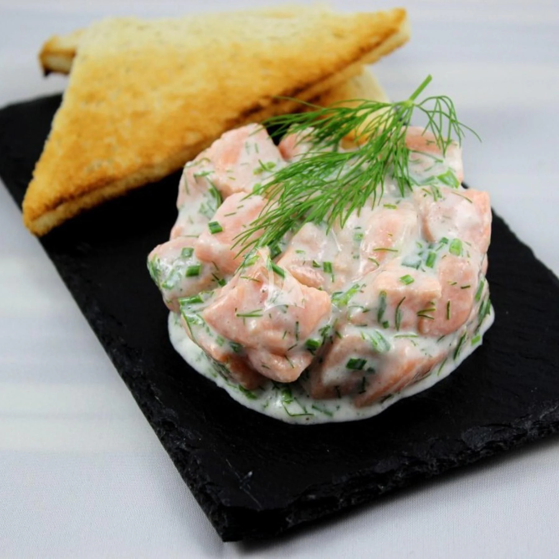 a plate of food aboard EDEN Yacht for Sale