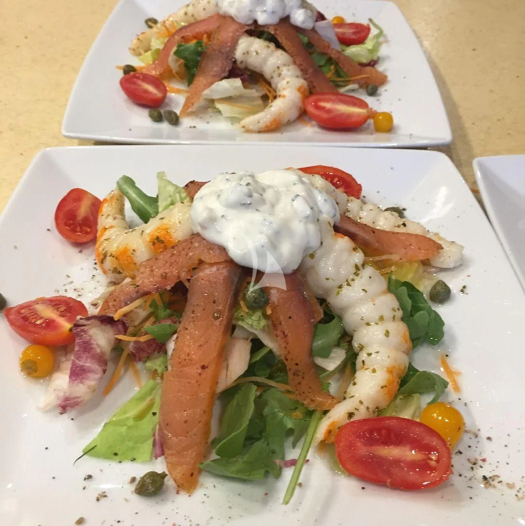a plate of food aboard EDEN Yacht for Sale