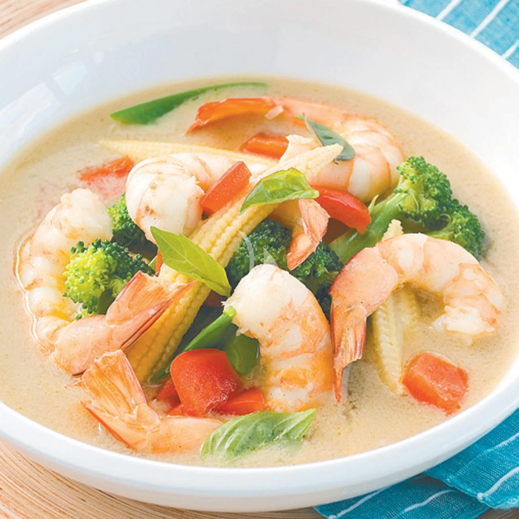 a bowl of shrimp and vegetables aboard EDEN Yacht for Sale
