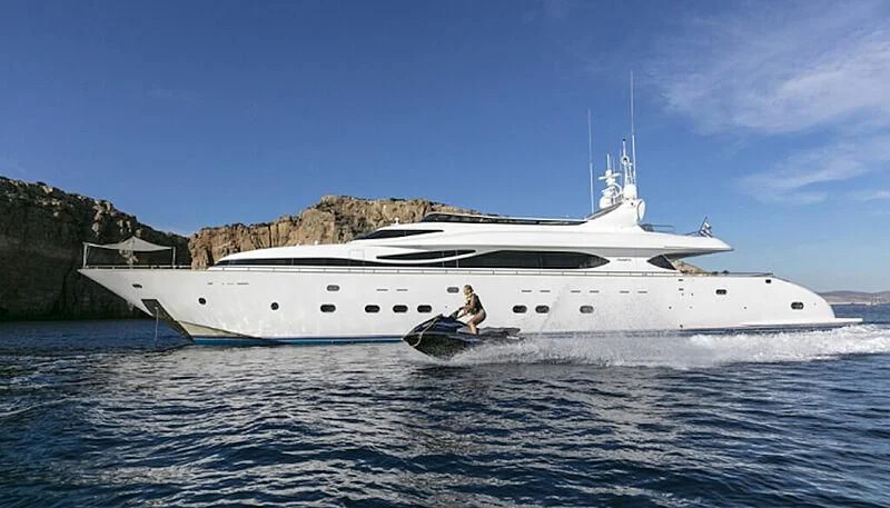 a white yacht on the water aboard ANASA Yacht for Sale