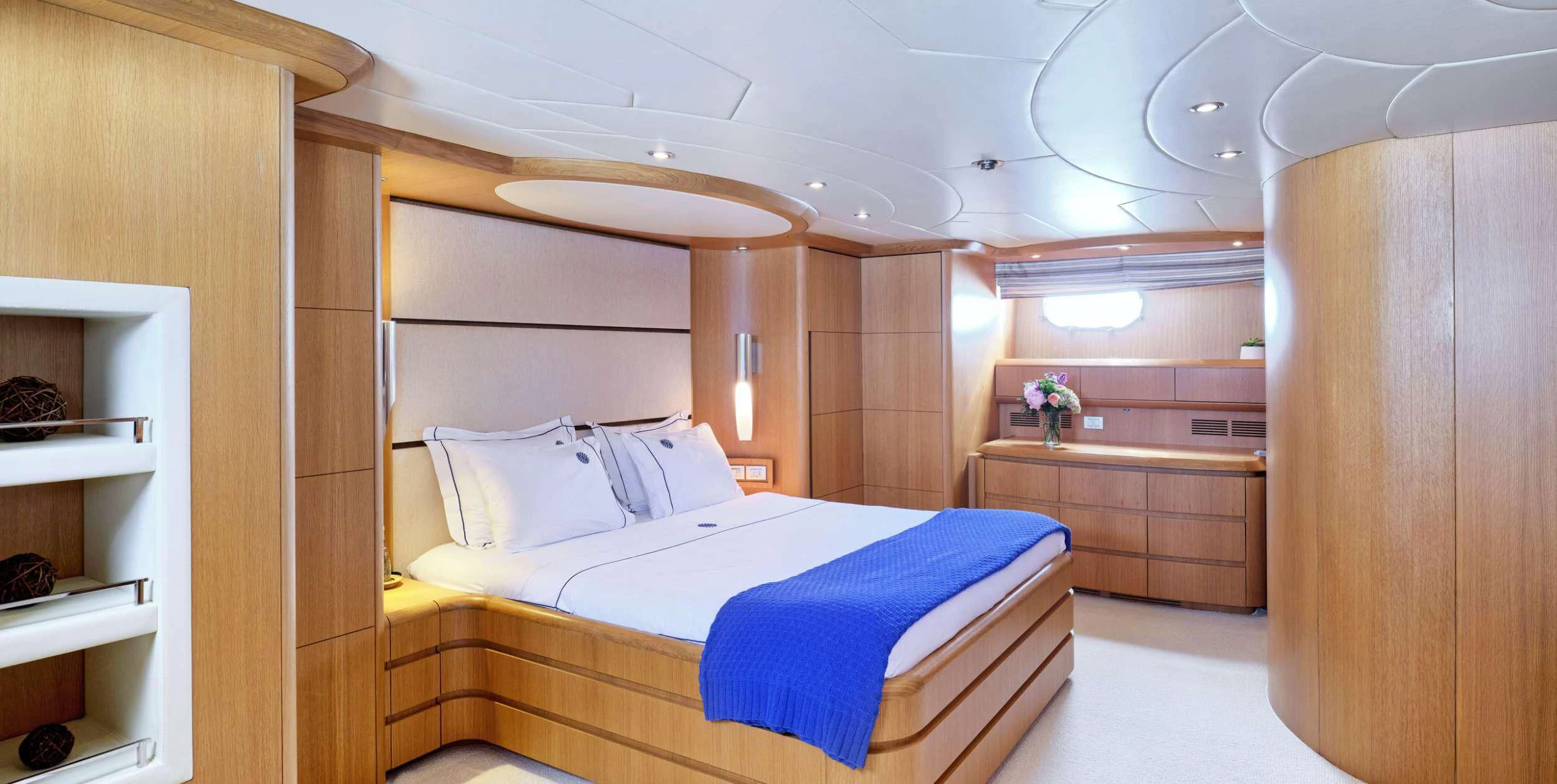 a room with a bed and a shelf aboard ANASA Yacht for Sale