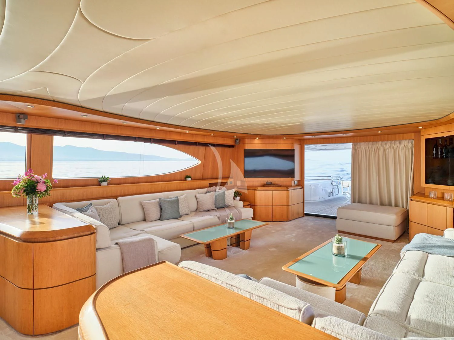 a living room with a large window aboard ANASA Yacht for Sale