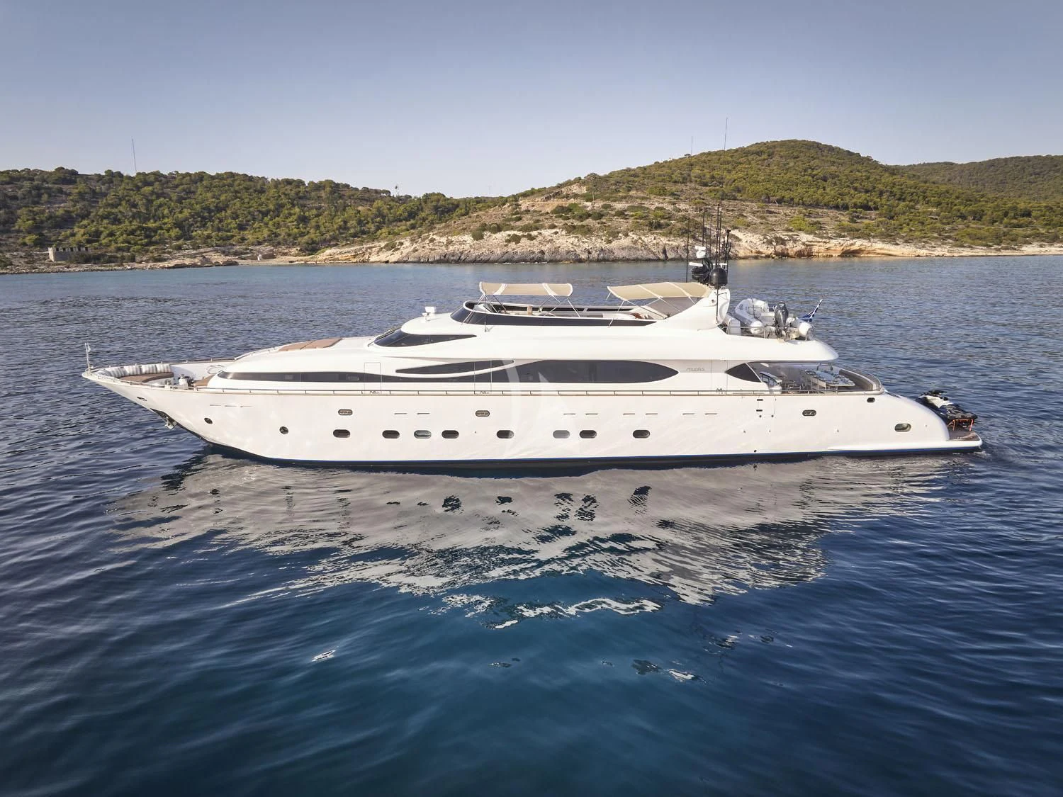 a white yacht in the water aboard ANASA Yacht for Sale