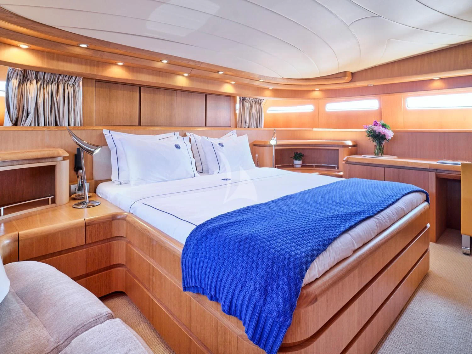 a room with a bed and a desk aboard ANASA Yacht for Sale