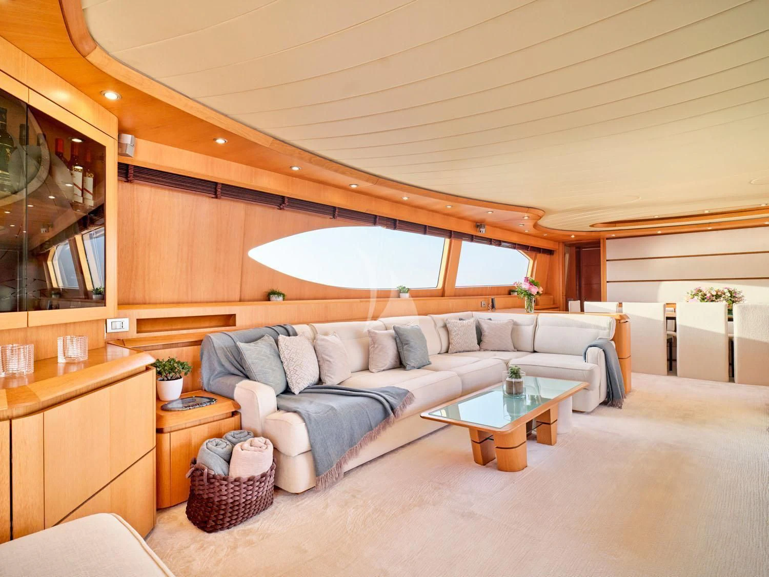 a living room with a couch and a table aboard ANASA Yacht for Sale