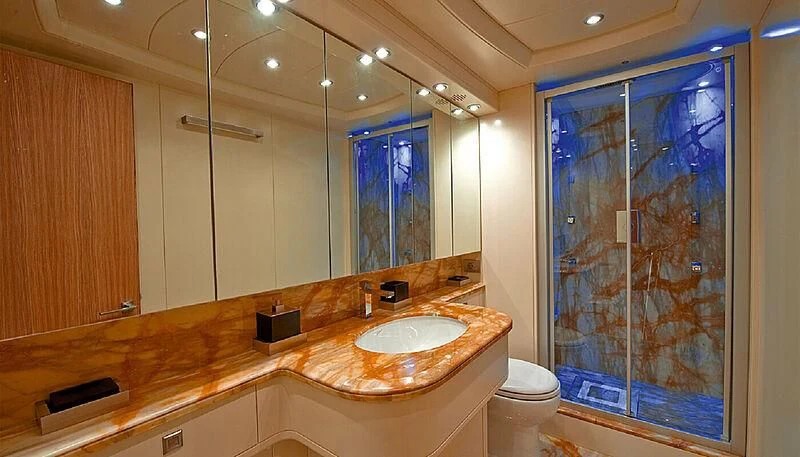 a bathroom with a large mirror aboard ANASA Yacht for Sale