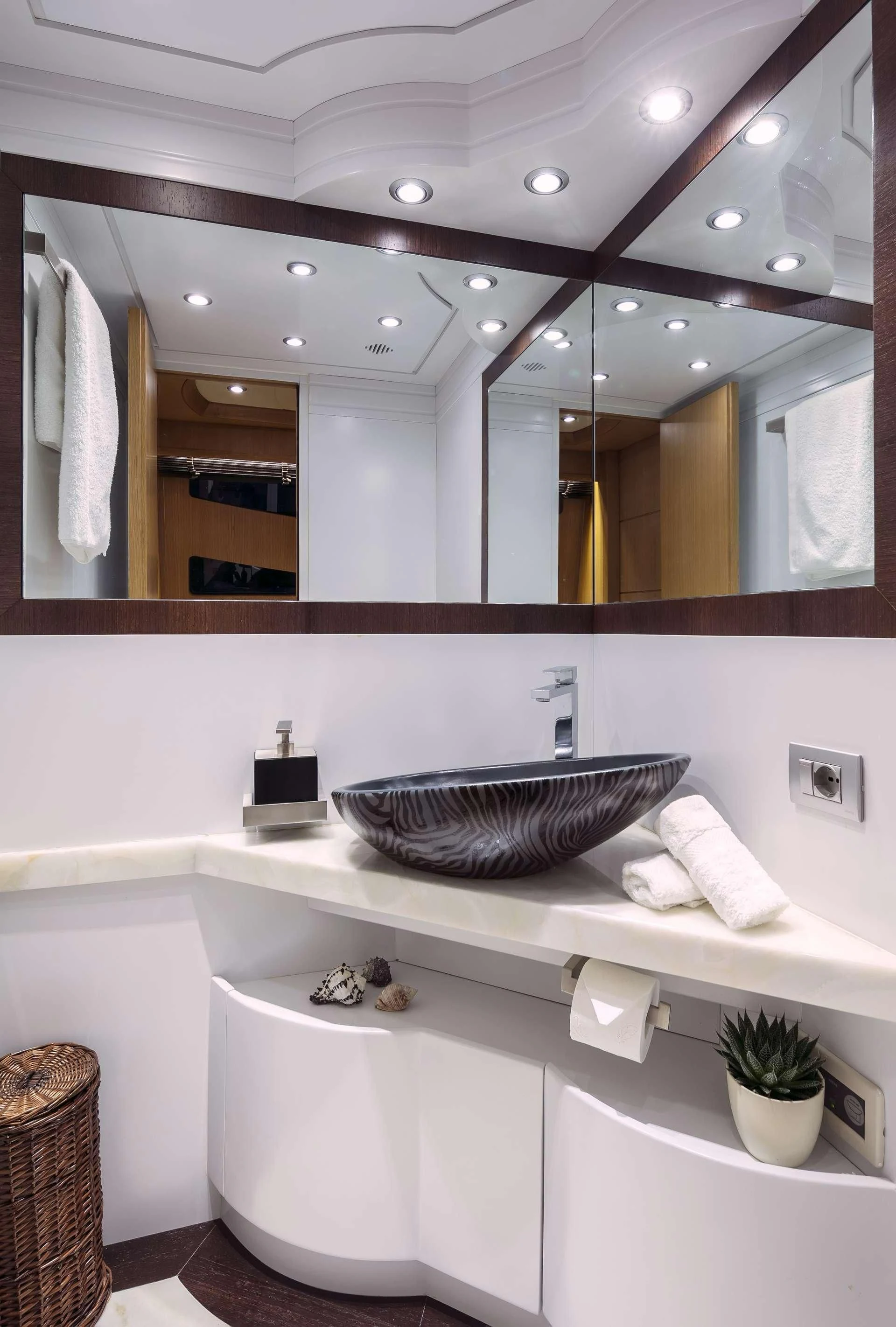 a bathroom with a large mirror aboard ANASA Yacht for Sale