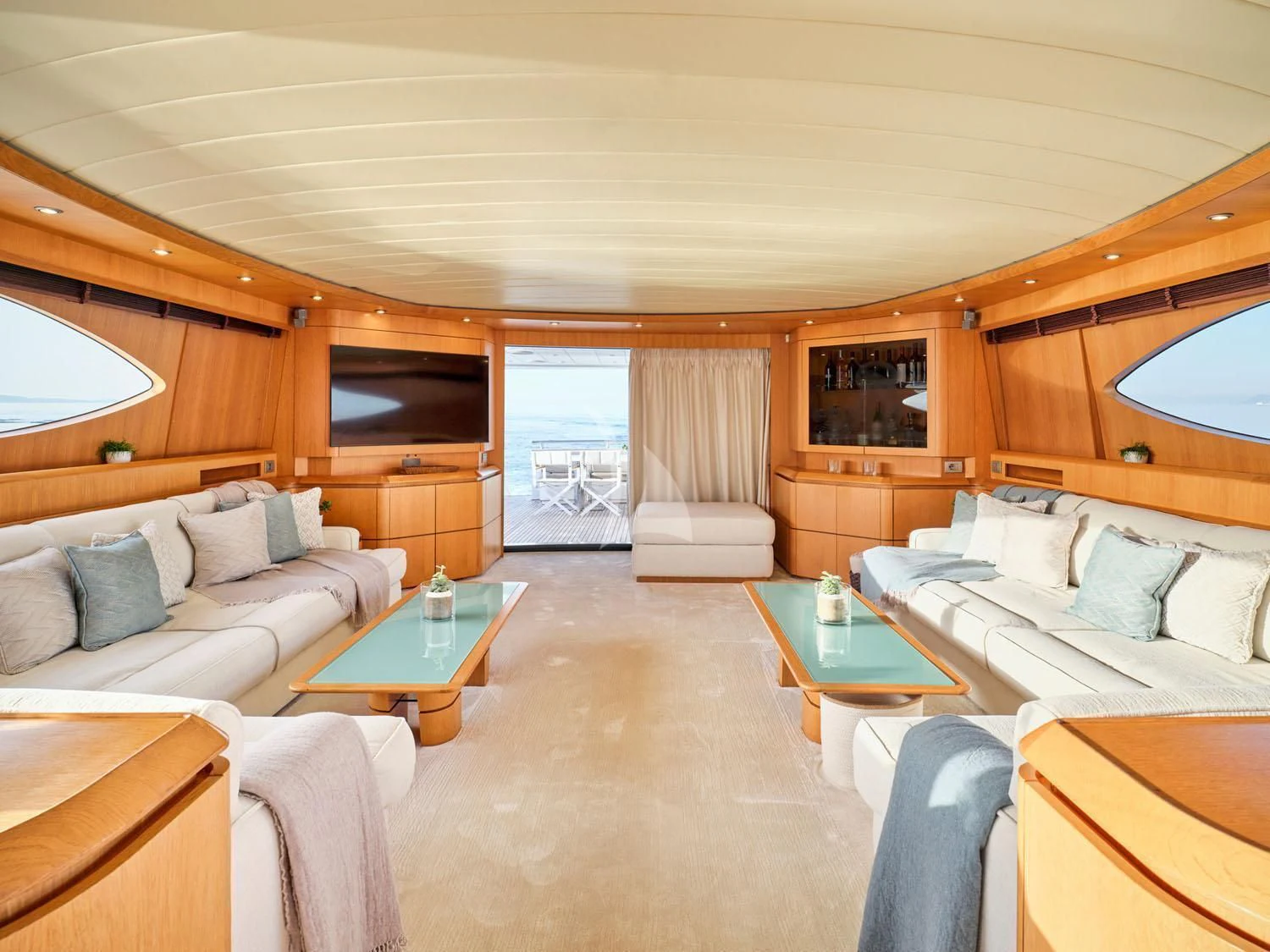 a living room with a couch and a table aboard ANASA Yacht for Sale