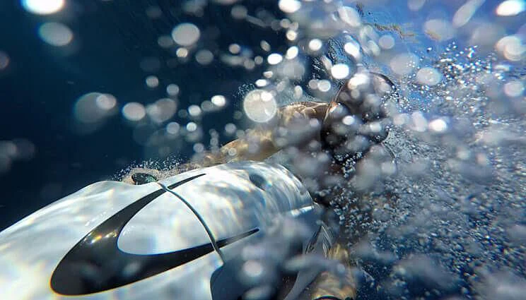 a pair of scuba divers aboard ANASA Yacht for Sale