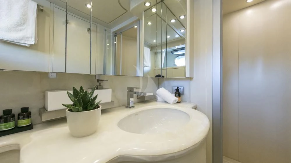 a bathroom with a large mirror aboard ANASA Yacht for Sale