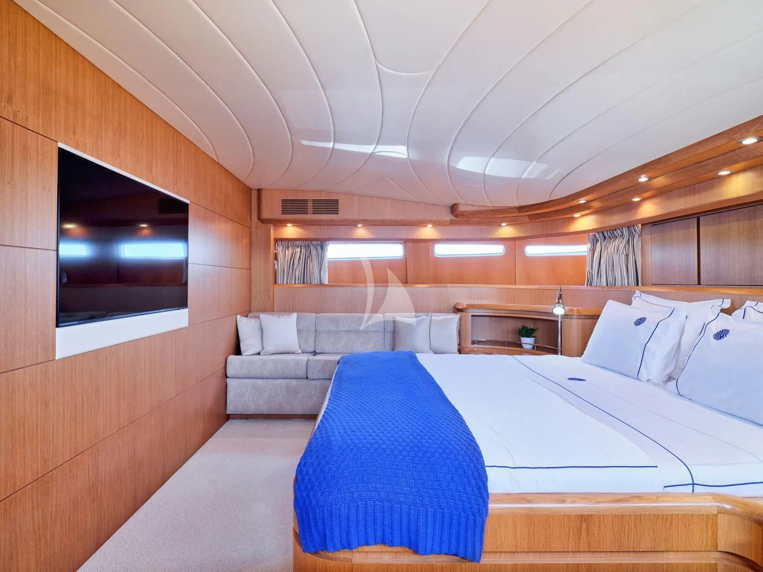 a room with a bed and a tv aboard ANASA Yacht for Sale