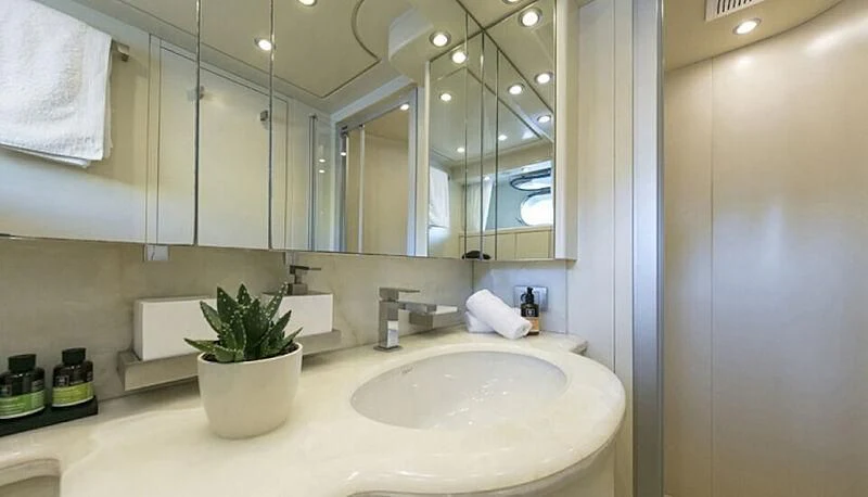 a bathroom with a large mirror aboard ANASA Yacht for Sale