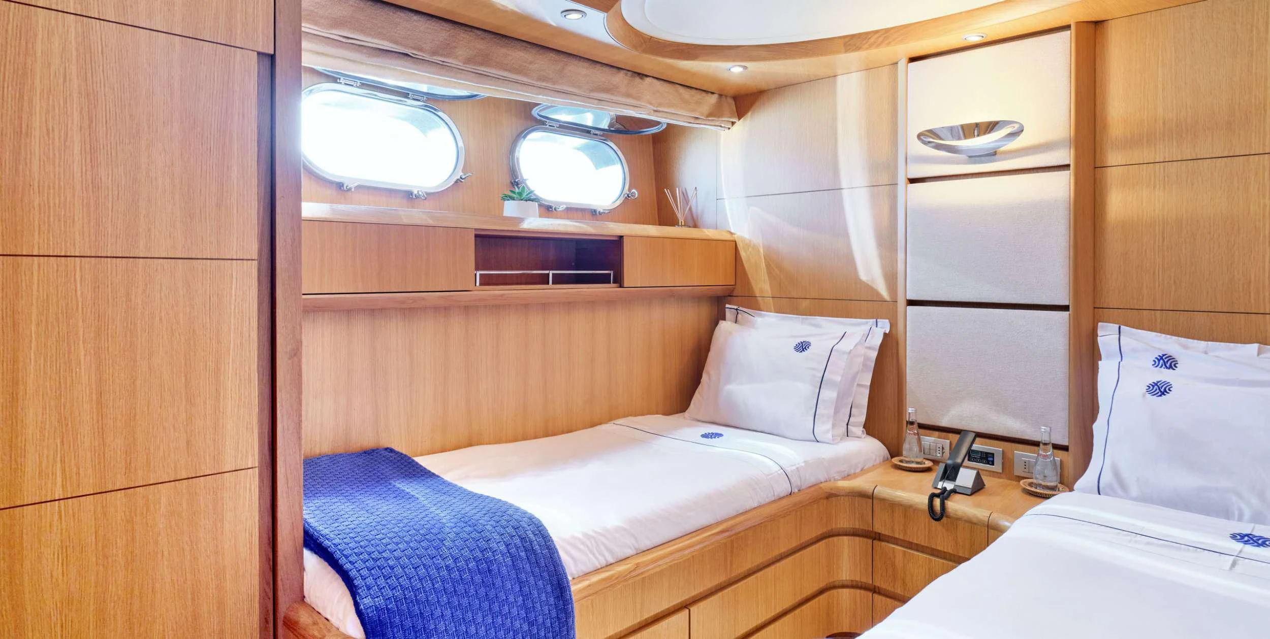 a room with two beds aboard ANASA Yacht for Sale