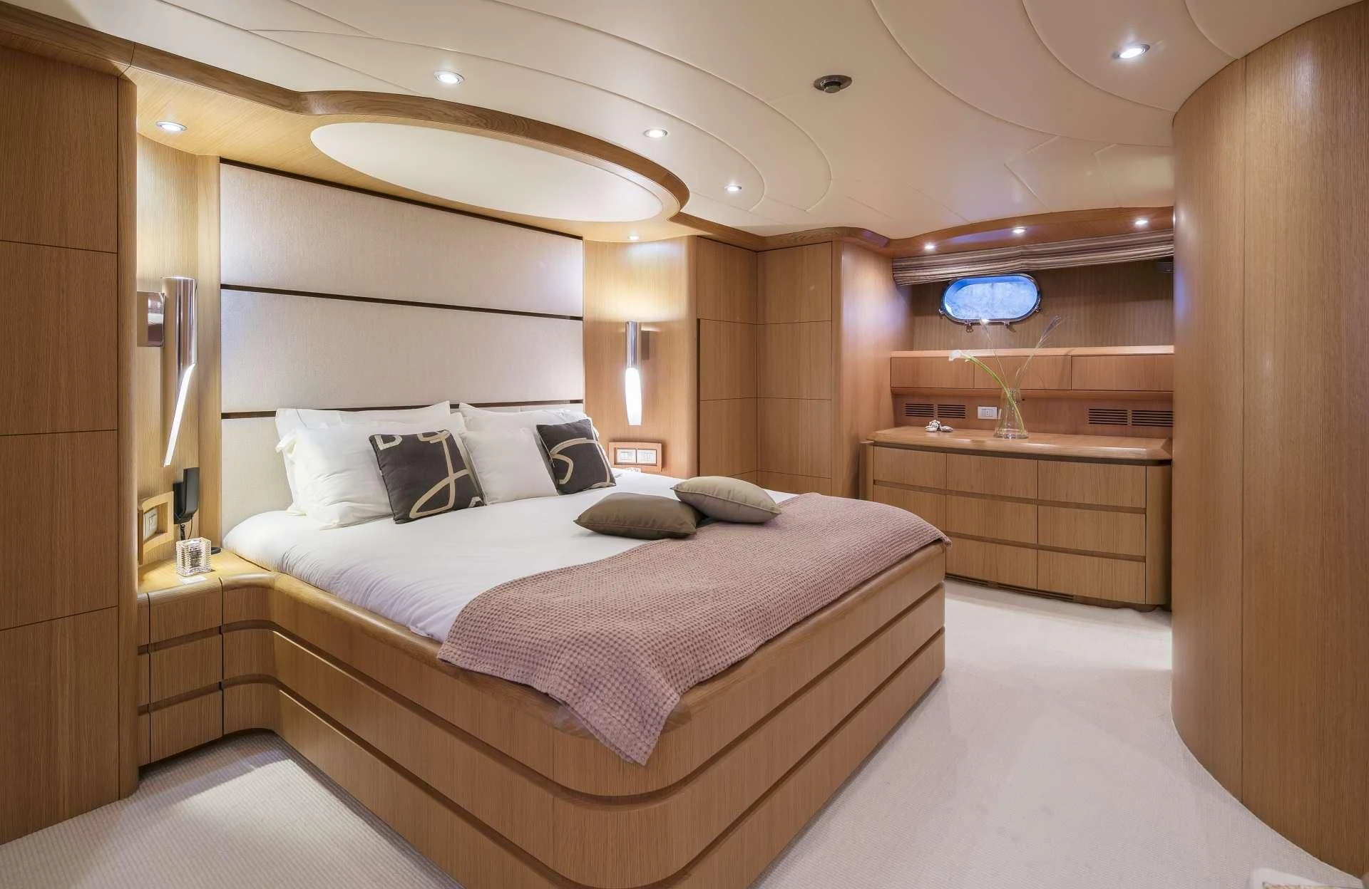 a room with a bed and a desk aboard ANASA Yacht for Sale