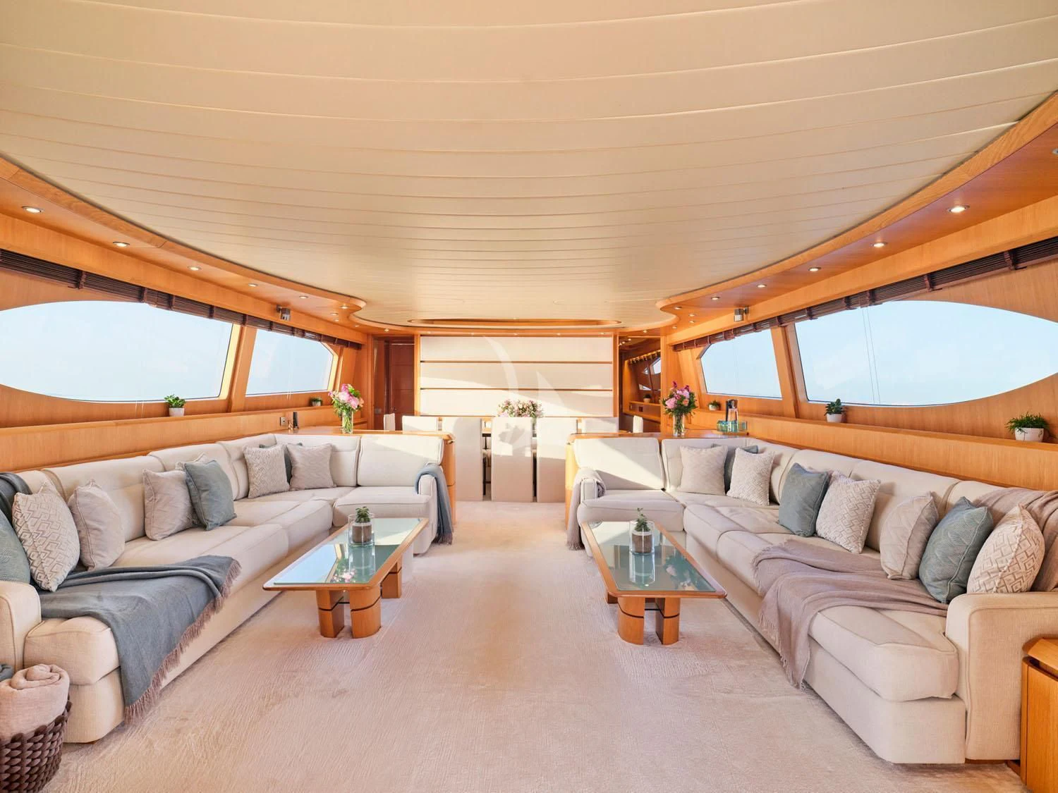 a living room with a couch and a table aboard ANASA Yacht for Sale