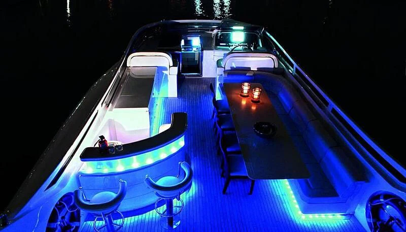a pool table and chairs on a deck aboard ANASA Yacht for Sale