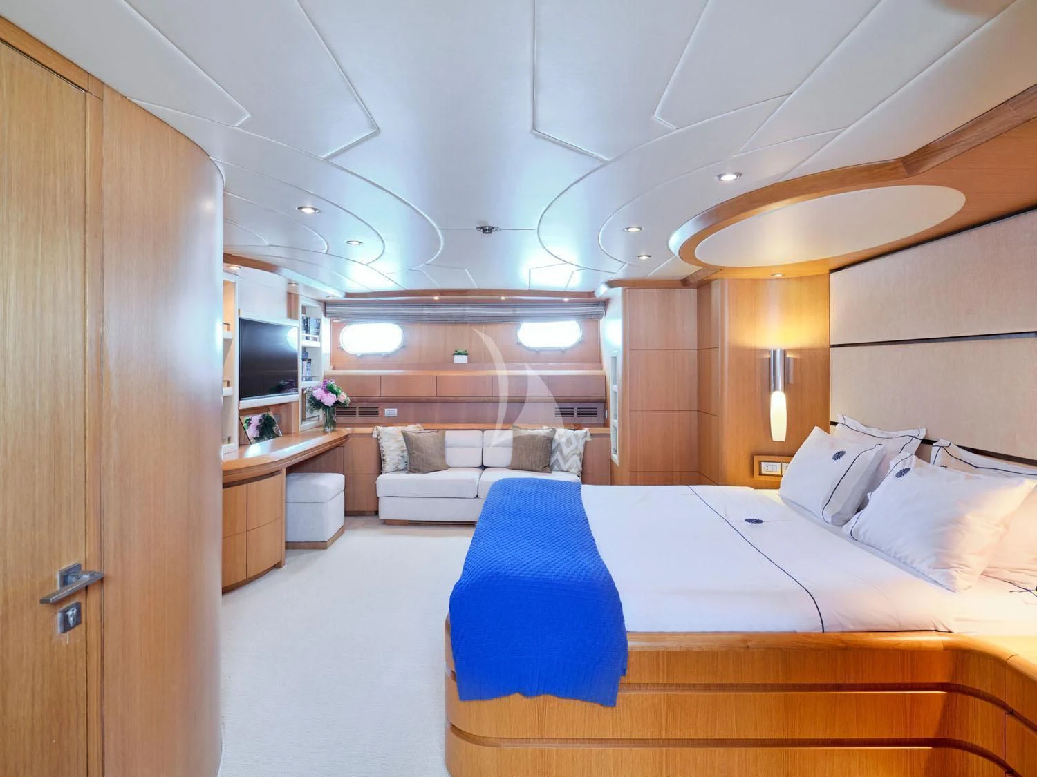 a room with a bed and a couch aboard ANASA Yacht for Sale