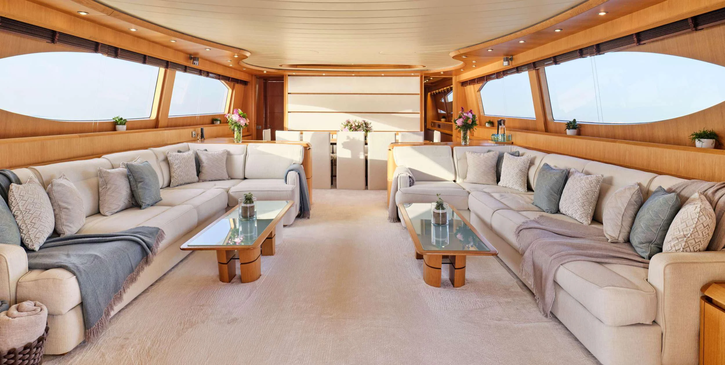a living room with a couch and a coffee table aboard ANASA Yacht for Sale