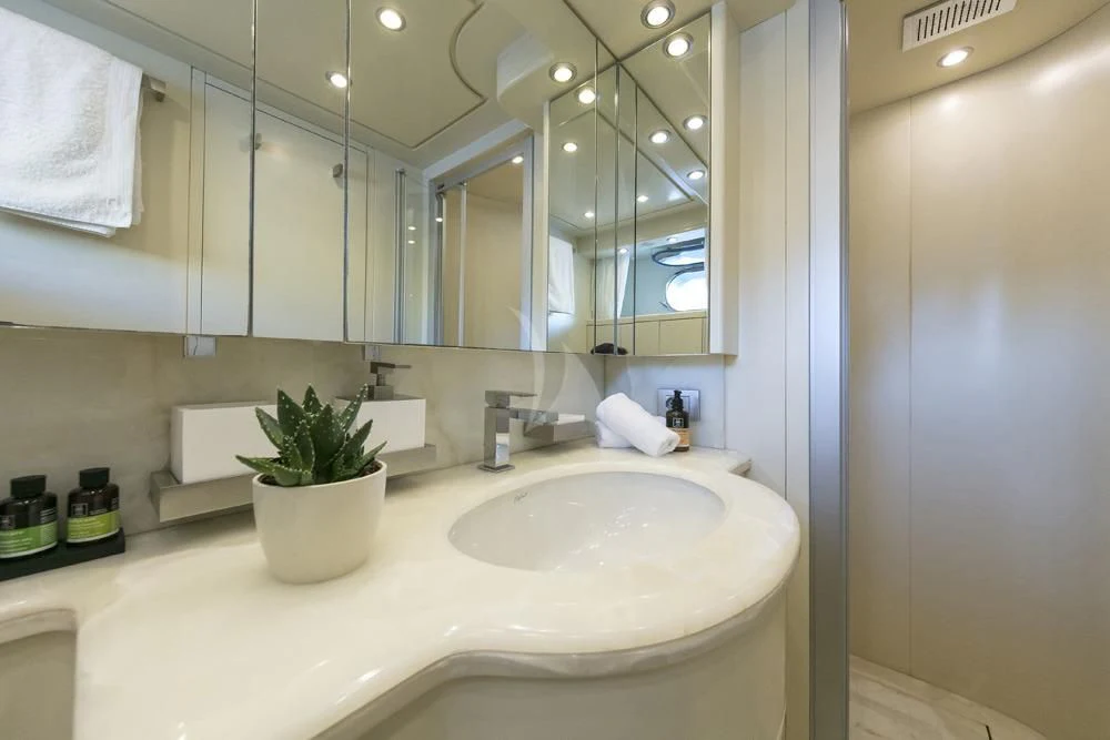 a bathroom with a large mirror aboard ANASA Yacht for Sale