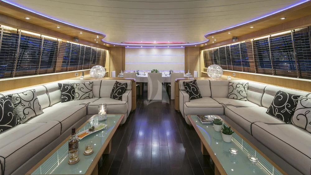 a living room with a large window aboard ANASA Yacht for Sale