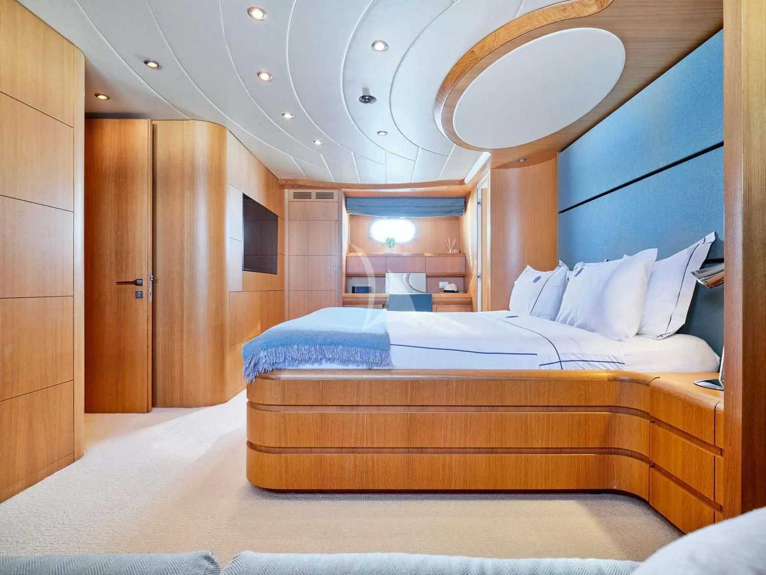 a room with a bed and a wood door aboard ANASA Yacht for Sale
