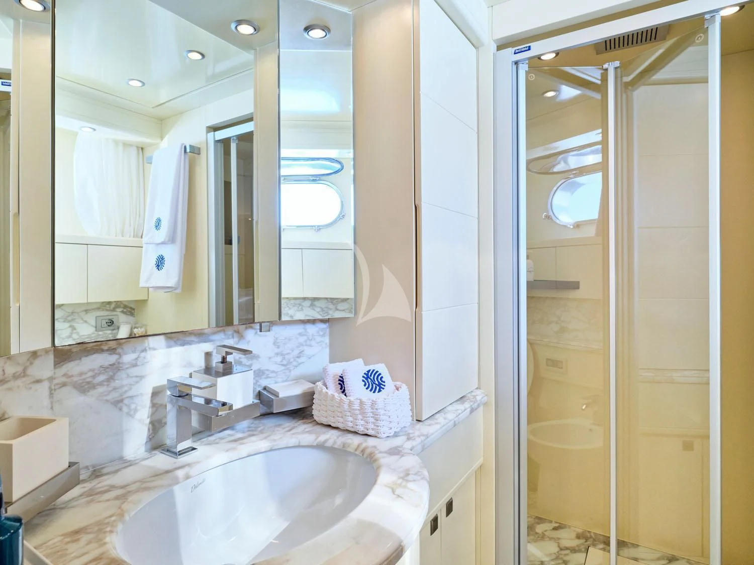 a bathroom with a large mirror aboard ANASA Yacht for Sale