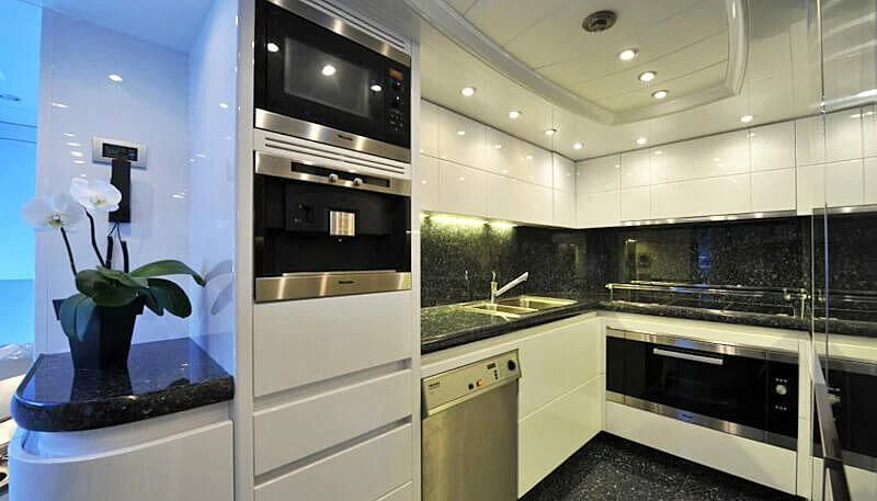 a kitchen with a large oven aboard ANASA Yacht for Sale