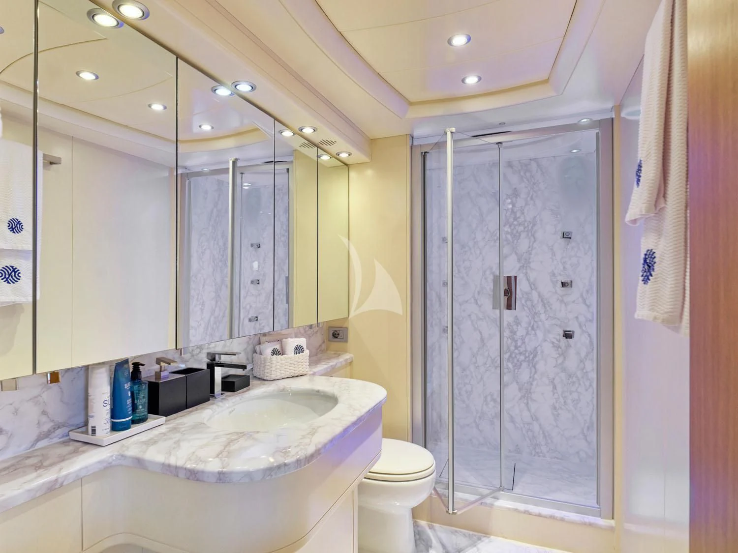 a bathroom with a tub sink and toilet aboard ANASA Yacht for Sale