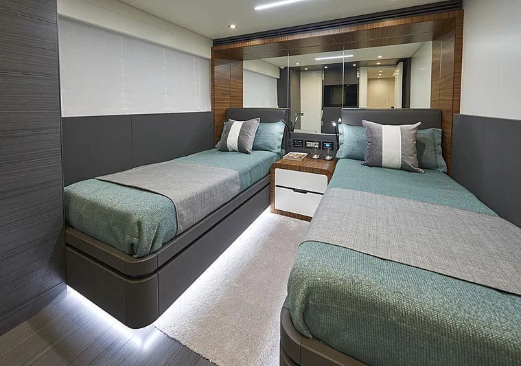 a couple of beds in a hotel room aboard NINITAS A Yacht for Sale