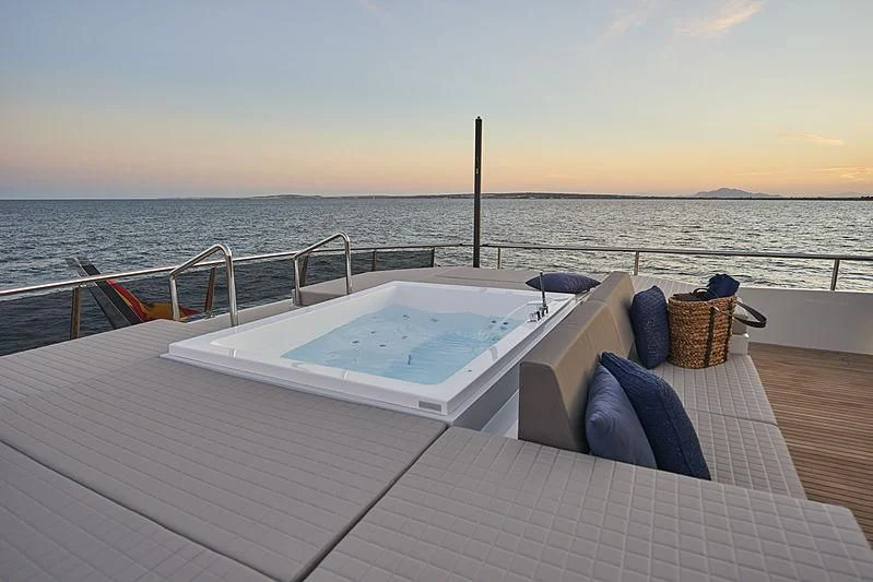 a boat on a deck aboard NINITAS A Yacht for Sale