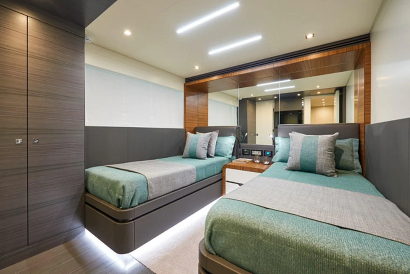 a couple of beds in a hotel room aboard NINITAS A Yacht for Sale