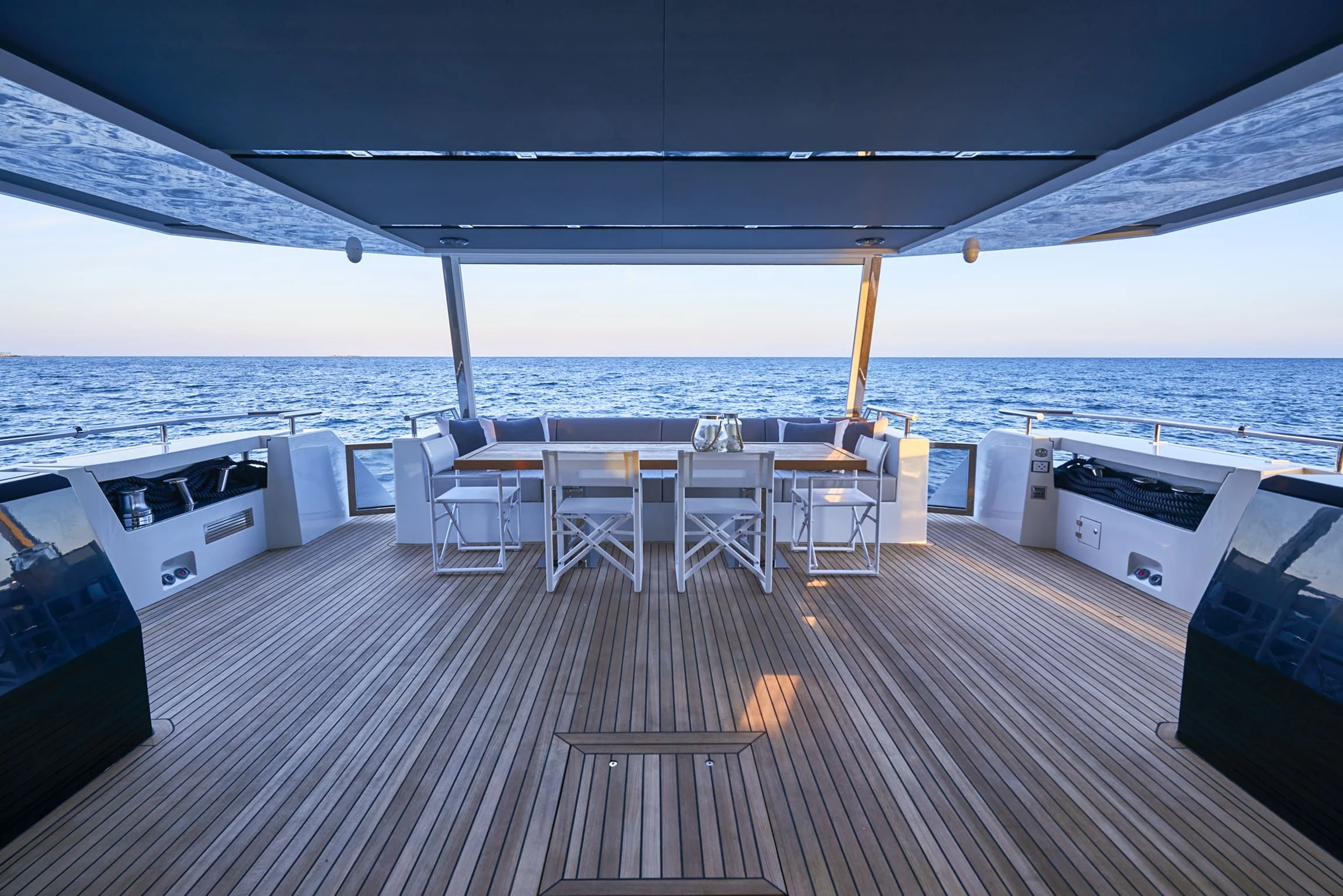 a deck with a view of the ocean and the deck aboard NINITAS A Yacht for Sale