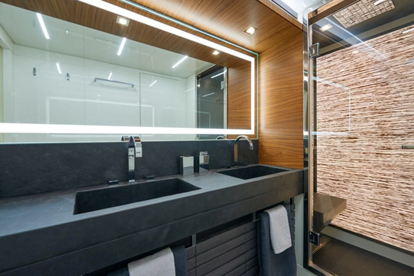 a bathroom with a sink and a mirror aboard NINITAS A Yacht for Sale