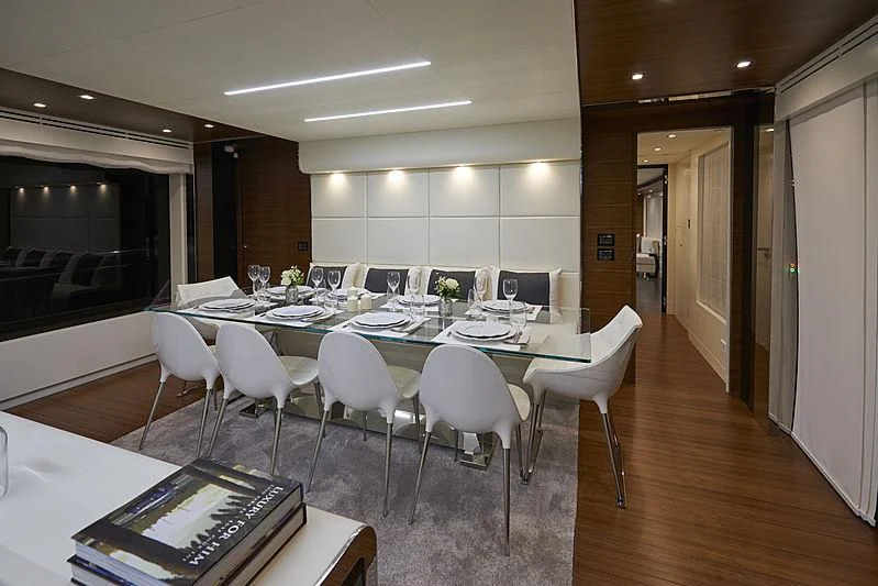 a conference room with tables and chairs aboard NINITAS A Yacht for Sale
