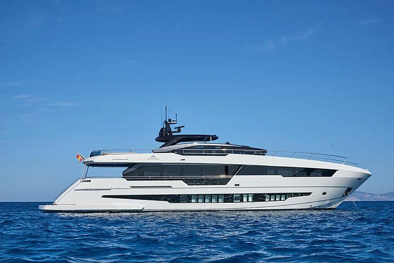 a white yacht in the water aboard NINITAS A Yacht for Sale