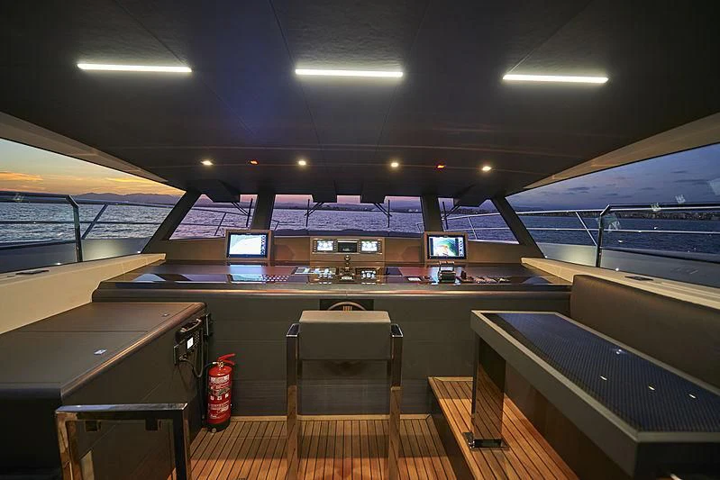 a room with a table and chairs aboard NINITAS A Yacht for Sale