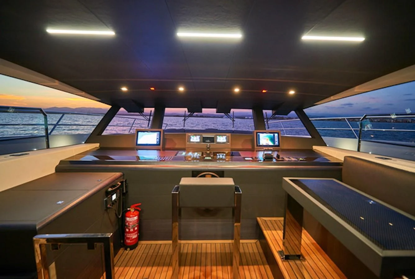 a room with a table and chairs aboard NINITAS A Yacht for Sale