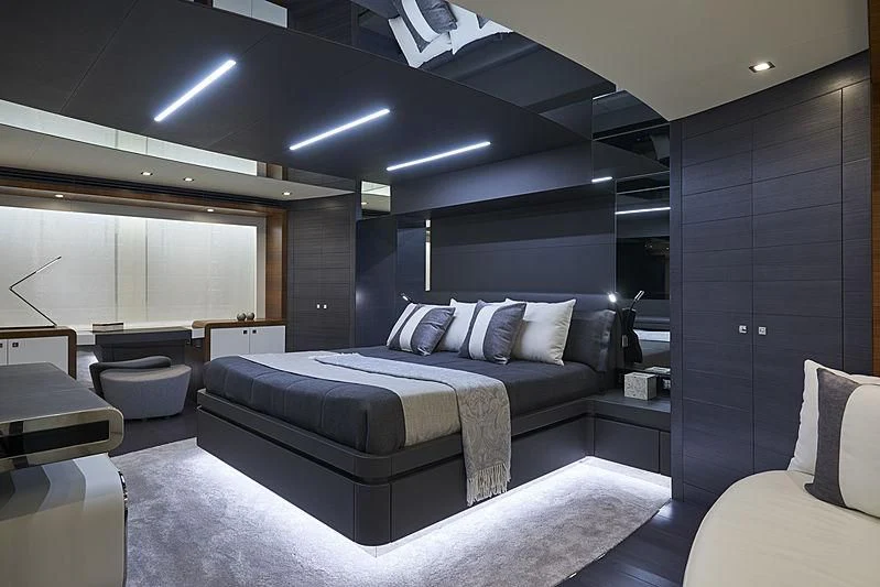 a room with a bed and a couch aboard NINITAS A Yacht for Sale
