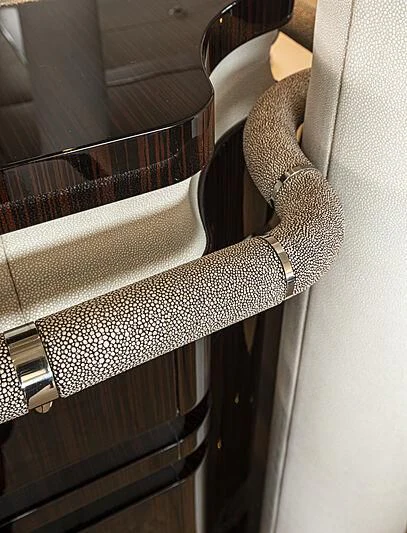 a pair of white socks on a white chair aboard M5 Yacht for Sale