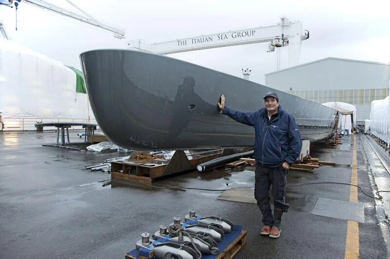 a man standing next to a jet aboard M5 Yacht for Sale