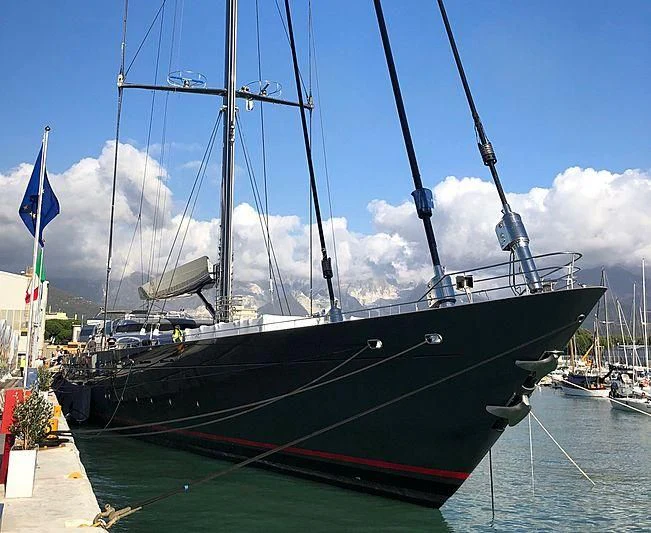 a large ship docked aboard M5 Yacht for Sale