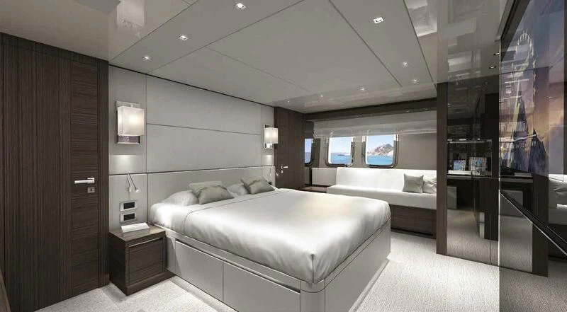 a room with a bed and a mirror aboard QUEEN MARTINA Yacht for Sale