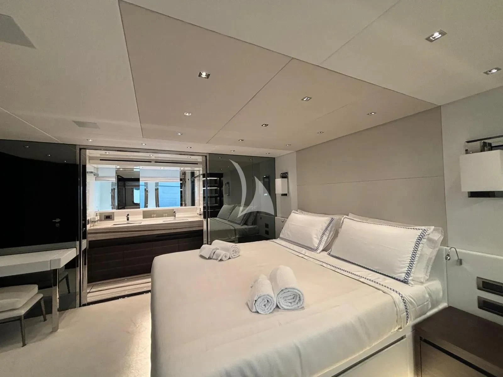 a room with a bed and a television aboard QUEEN MARTINA Yacht for Sale