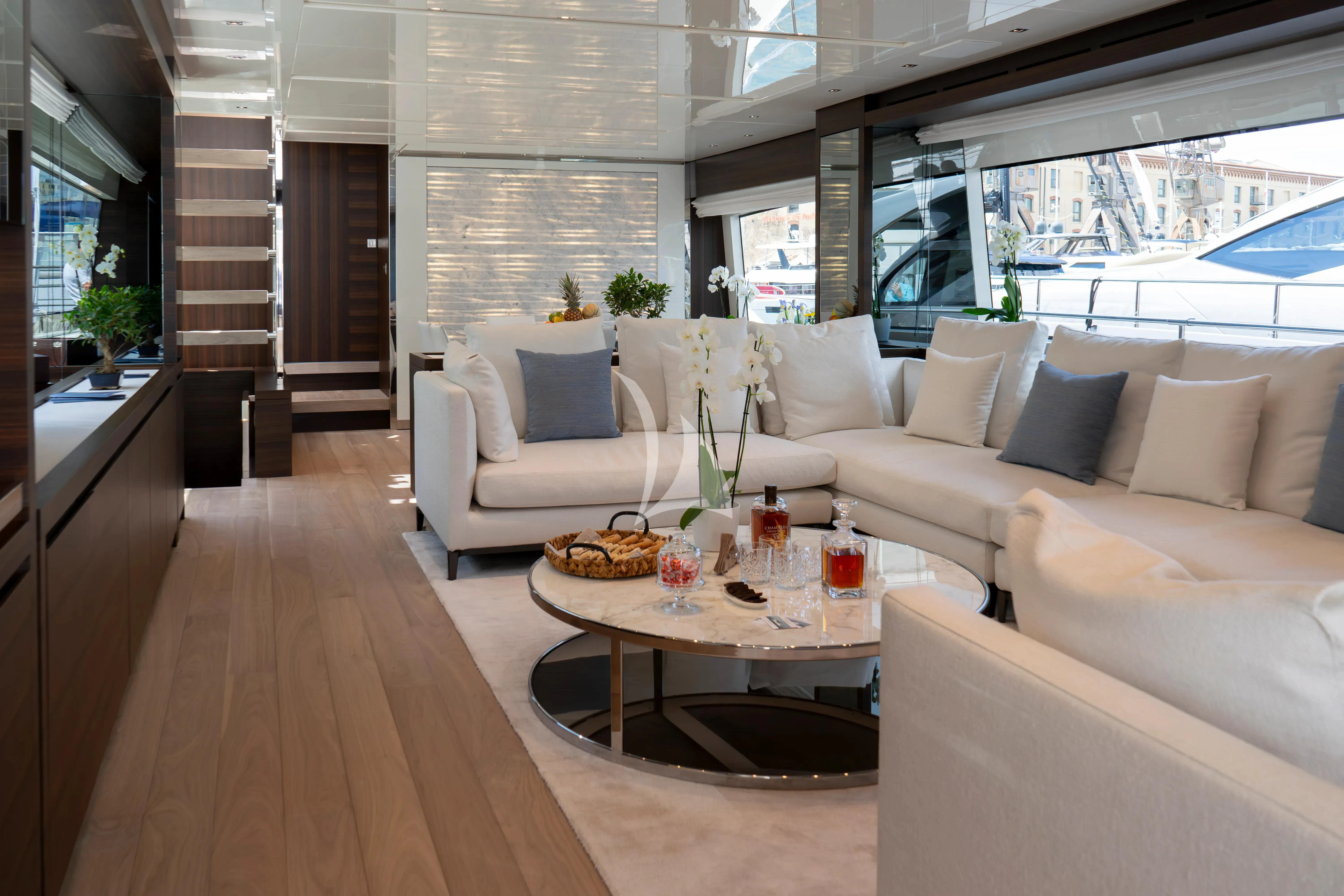 a living room with a large window aboard QUEEN MARTINA Yacht for Sale