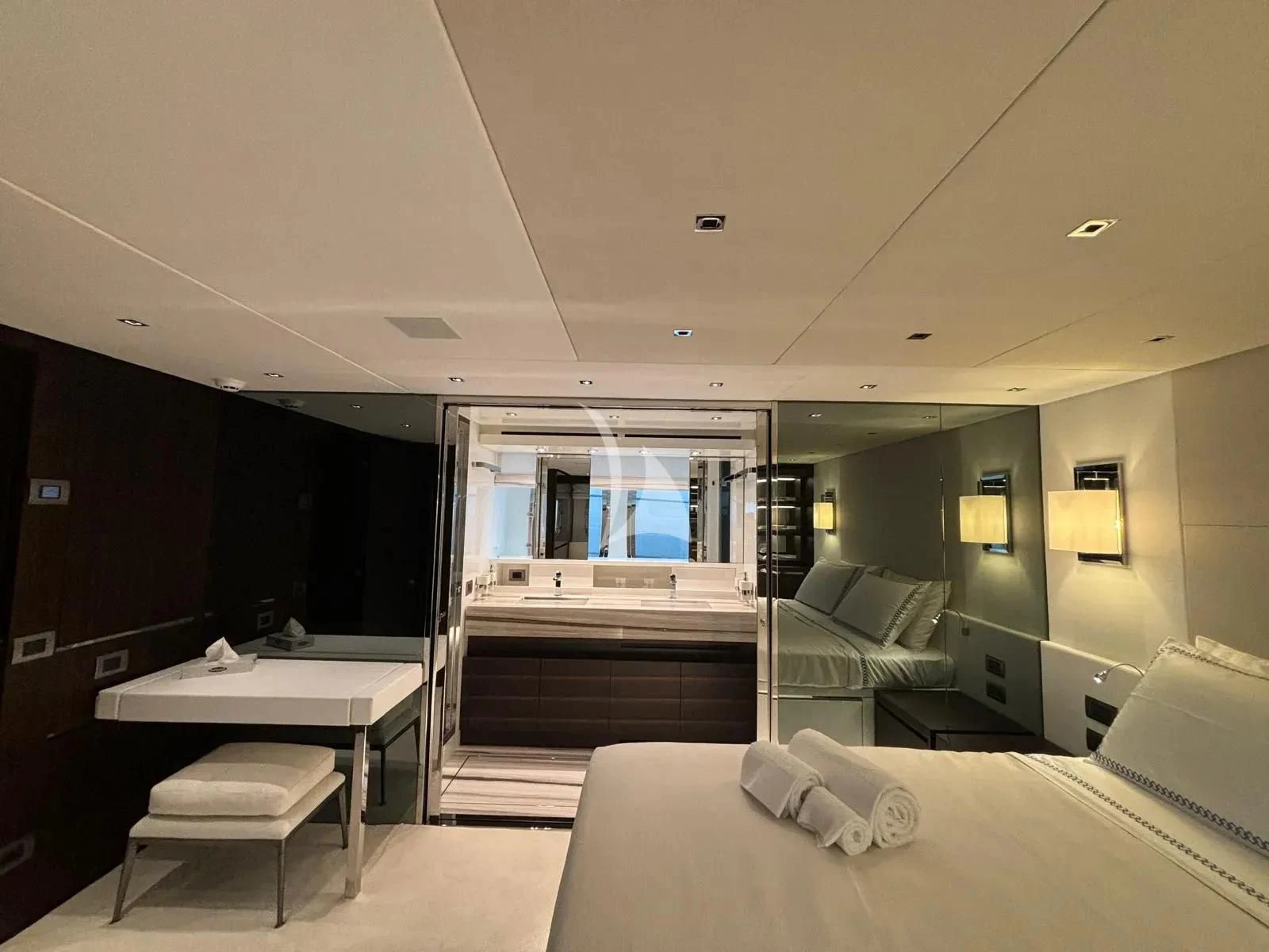 a room with a bed and a desk aboard QUEEN MARTINA Yacht for Sale