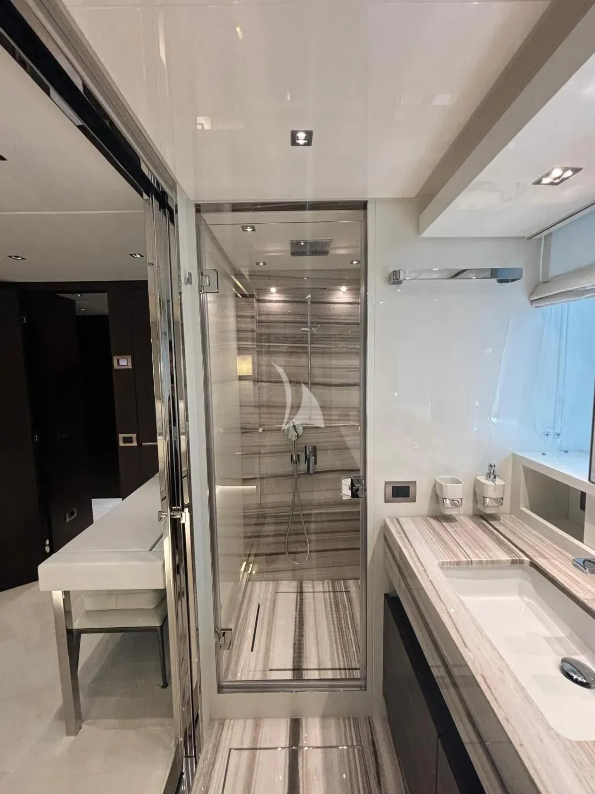 a bathroom with a glass shower aboard QUEEN MARTINA Yacht for Sale