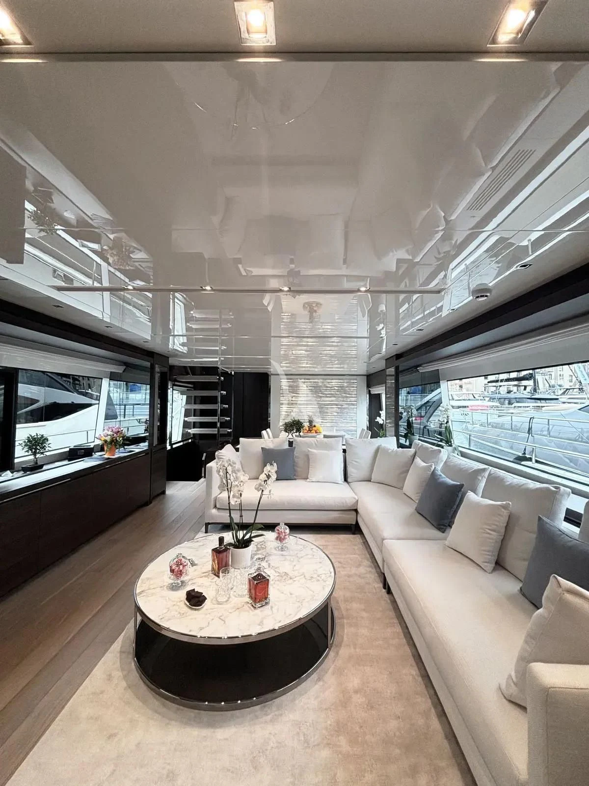 a living room with a large window aboard QUEEN MARTINA Yacht for Sale