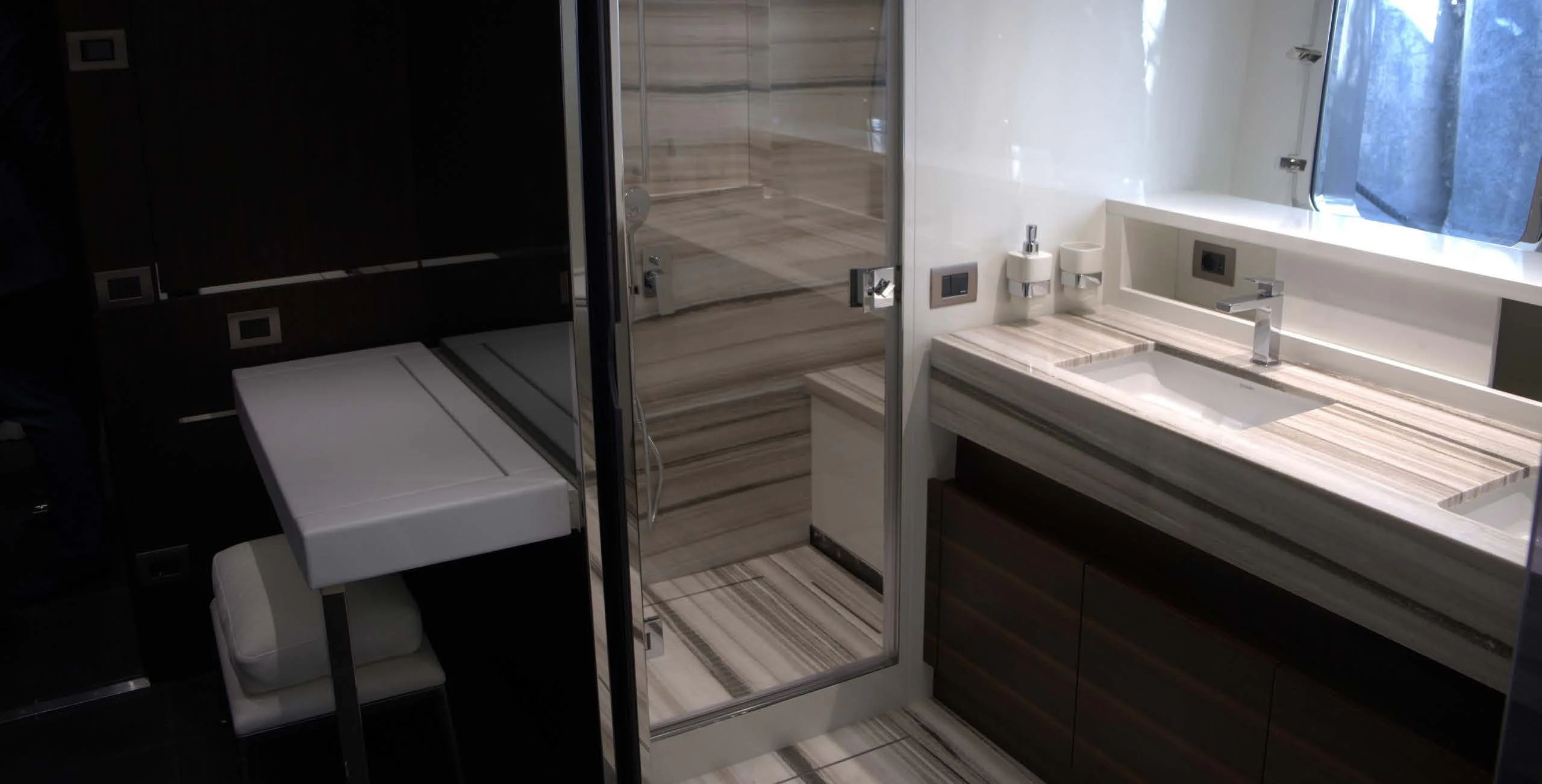 a bathroom with a shower unit and sink aboard QUEEN MARTINA Yacht for Sale